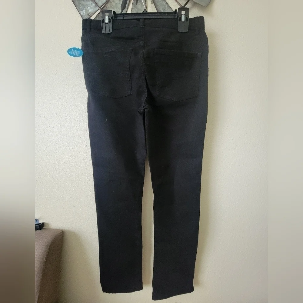 The children place Black super skinny jeans size 16 Husky.